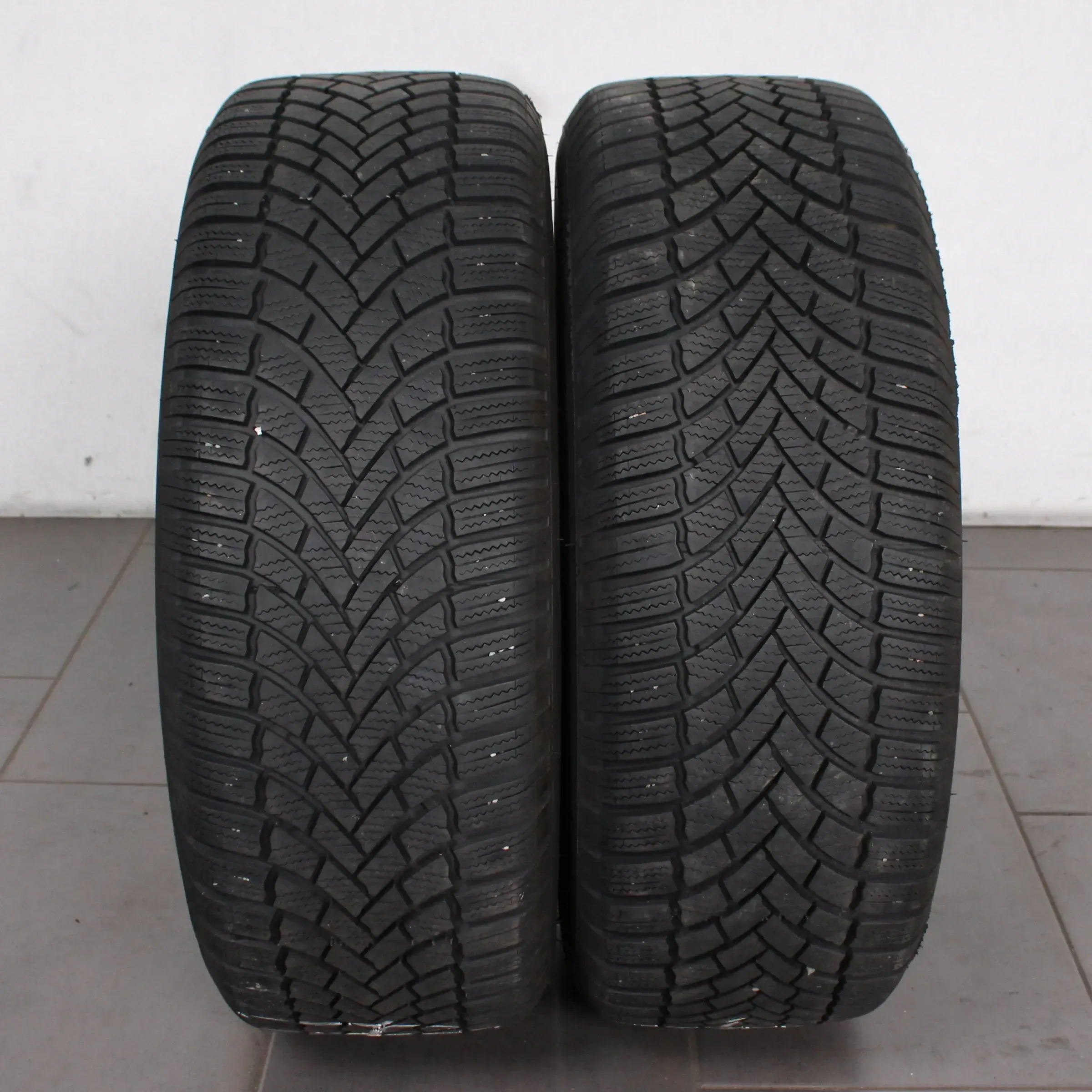 2x Winterreifen 215/60 R16 99H Bridgestone Blizzak LM005 Dot: 3319 5,5-6mm - Bild 1